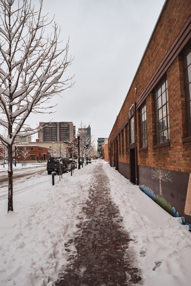 Snow snowy sidewalk downtown area unsplash